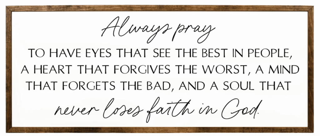 A sign with cursive on top and capital letters in middle